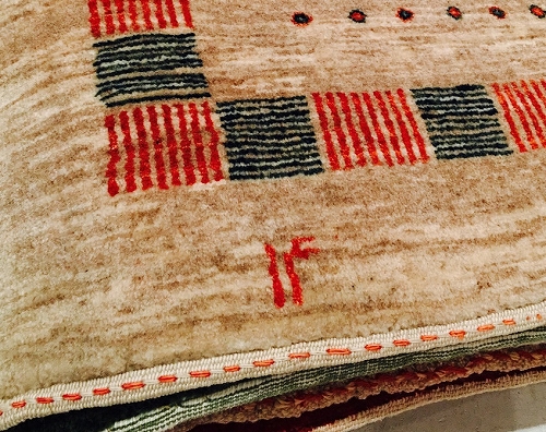 アートギャッベの織り子さんのサイン